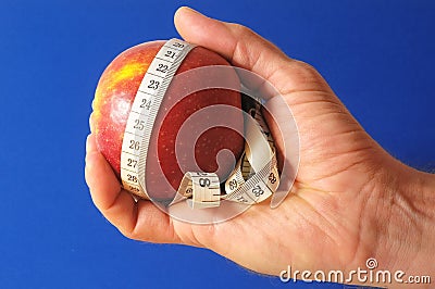 Diet Apple and Meter on the Hand