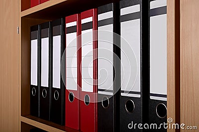 Files in office cupboard