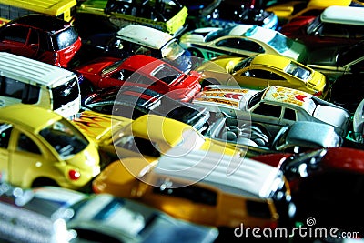 Different types and colors of toy cars