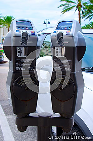 Digital parking meters that accept credit cards