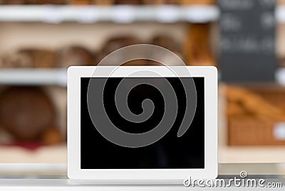 Digital Tablet On Bakery Shop Counter