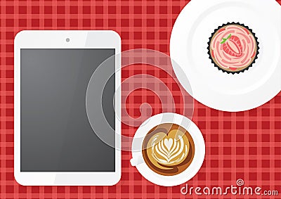 Digital Tablet With Coffee and Cupcake