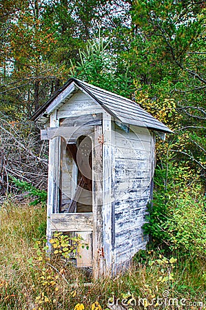 Dilapidated Outhouse in the Rural Wisconsin Countryside.