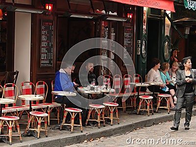 Diners enjoy a lunch at an outdoor bistro