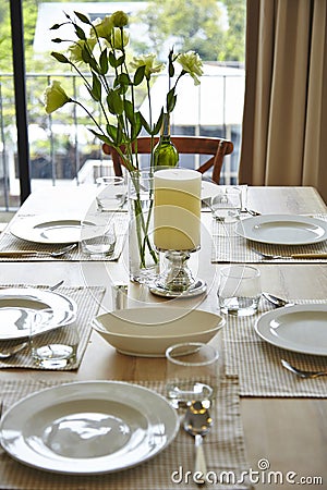 Dining table setting with flower