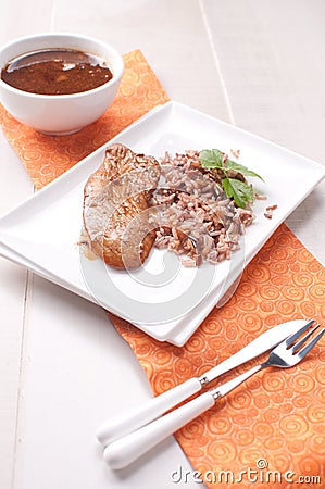 Dinner plate with polutry meat and rice