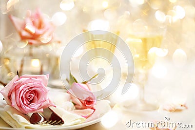 Dinner table with beautiful pink roses