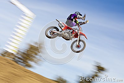 Dirt Bike Racer Jumping with Trick