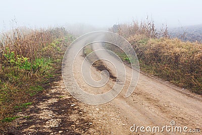 Dirt road in mist