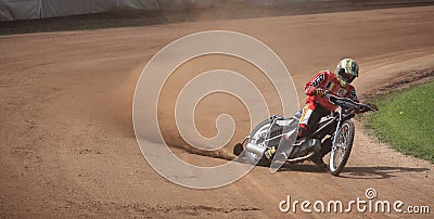 Dirt-track rider at high speed