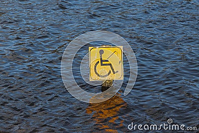 Disabled fishing sign in centre of lake