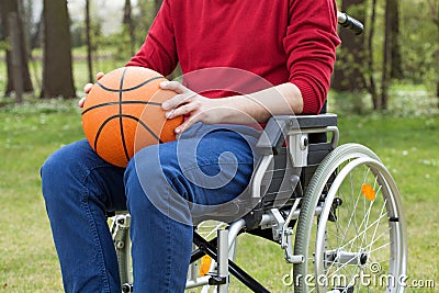 Disabled holding a basketball ball