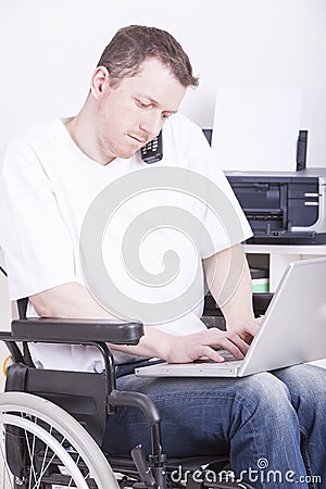 Disabled young man at the office