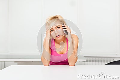 Disappointed woman using phone, sad call