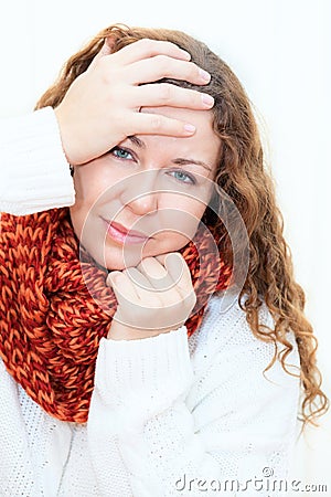 Diseased cold woman in red scarf and sweater