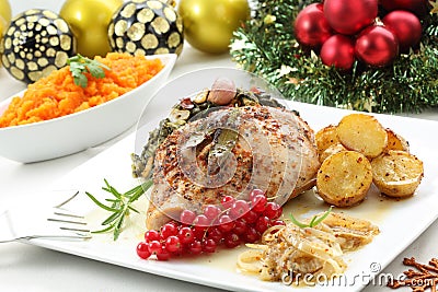 Dish of roasted turkey breast on a christmas table