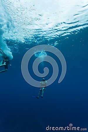 Divers descend into Blue Hole in Caribbean Sea Bel