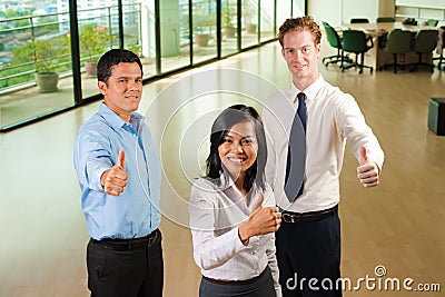 Diverse Business Team Three Thumbs Up