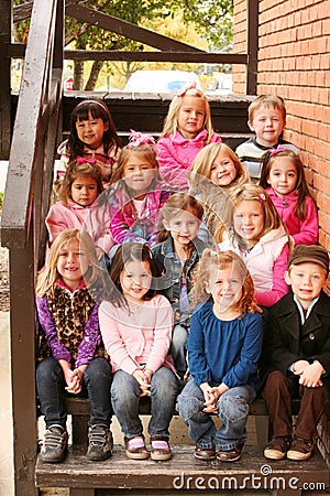 Diverse group of little kids outside
