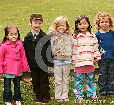 Diverse group of little kids outside