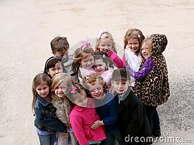 Diverse group of little kids outside