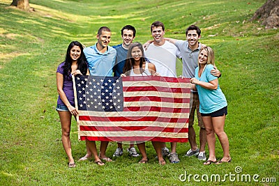 Diverse group of young people with American flag