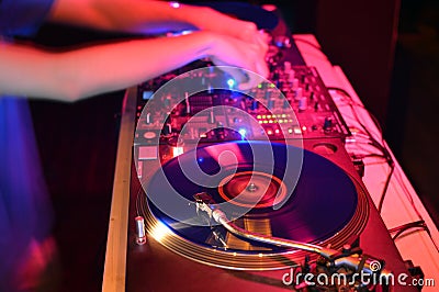 DJ Playing on Turntable
