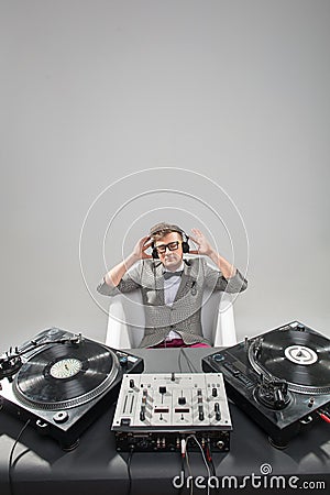 Dj at work in bath isolated on white background