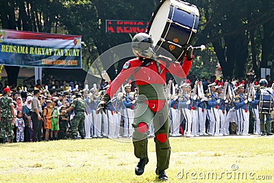 Do marching band by Indonesian Air Force cadets.