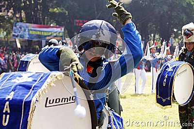 Do marching band by Indonesian Air Force cadets.