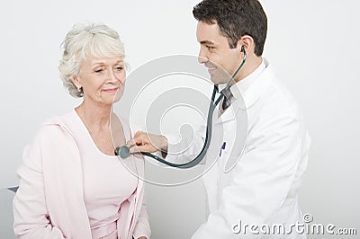 Doctor Checking Patient s Heartbeat Using Stethoscope