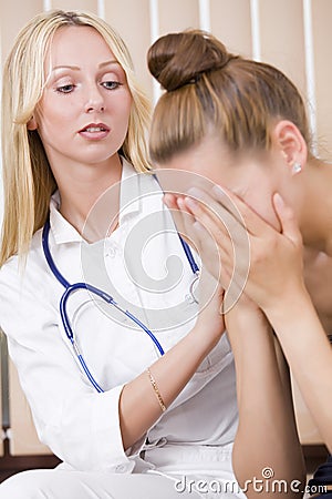 Doctor and crying patient