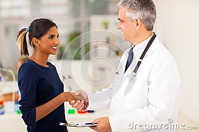 Doctor handshaking patient