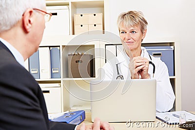 Doctor in her office talking