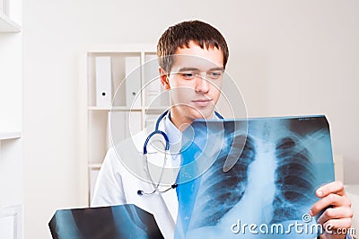 Doctor looking the x-ray