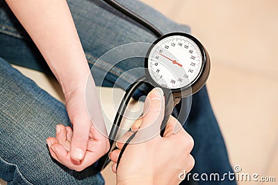 Doctor measuring blood pressure of child