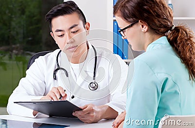 Doctor and nurse consultation