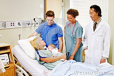 Doctor and nurse with new parents