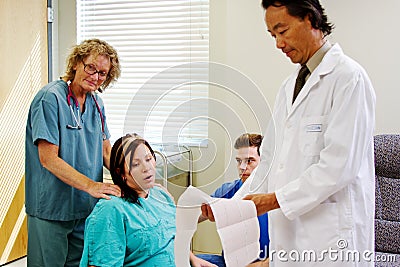 Doctor reviewing progress of labor