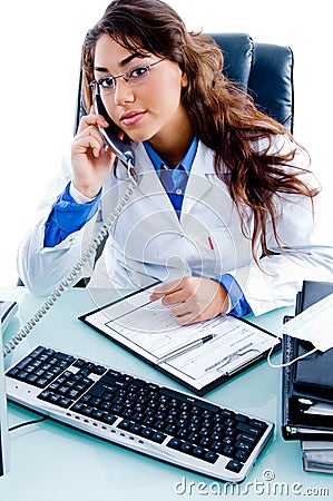 Doctor talking on phone