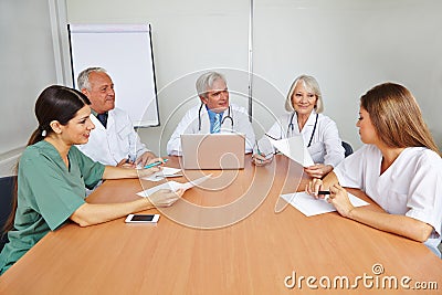 Doctors with applicant at job interview