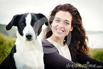 Dog and woman travel portrait