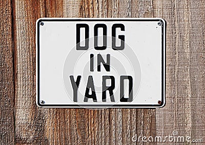 Dog in yard sign