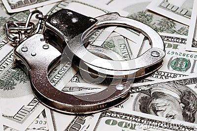 Dollars and handcuffs