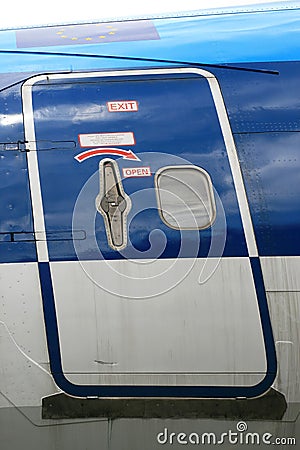 Door (with instructions) of an airplane