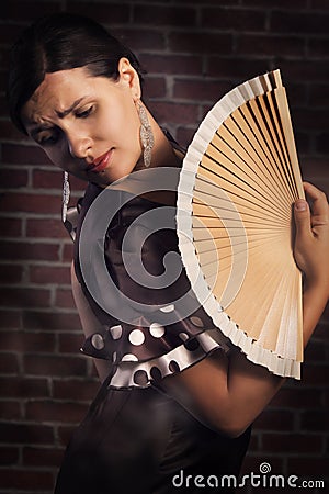Dramatic Flamenco dance with hand fan
