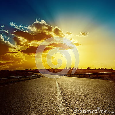 Dramatic sunset over road