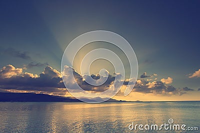 Dramatic tropical sunset sky and sea at dusk