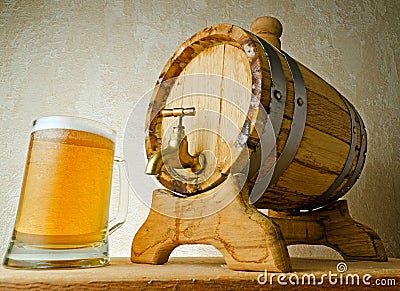 Beer and barrel on the wood table