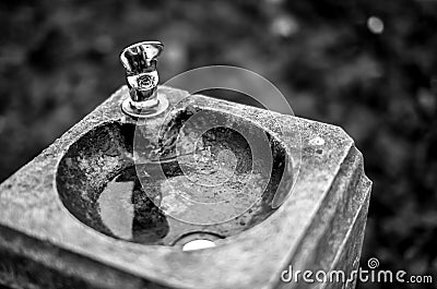 Drinking fountain in black and white